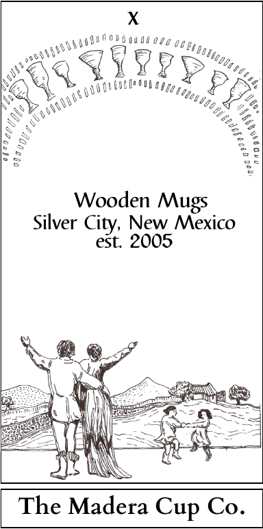 Original Madera Cup Co. card: ten cups arch over a hand-drawn family scene. Wooden Mugs, Silver City, New Mexico, established 2005.